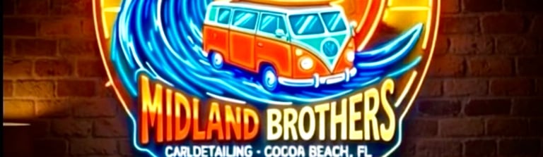 Neon sign for Midland Brothers car detailing featuring a red and white vintage van with blue wave designs on a brick wall